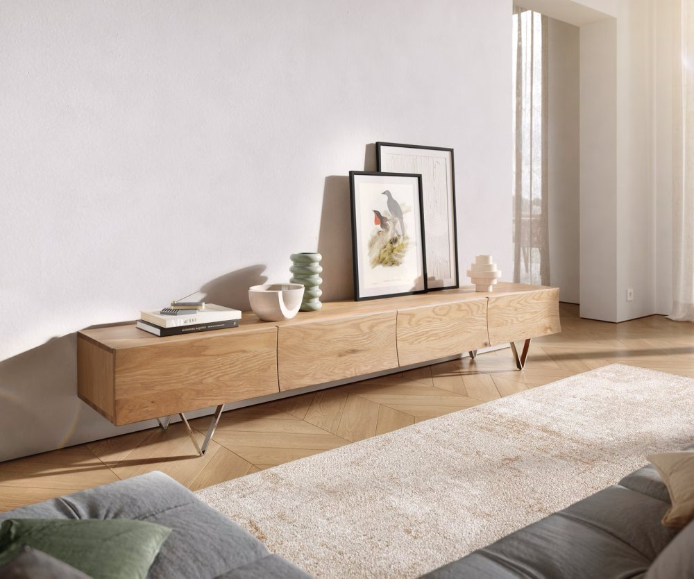 TV stolík Wyatt 220 cm prírodný dub 4 zásuvky podstavec v tvare